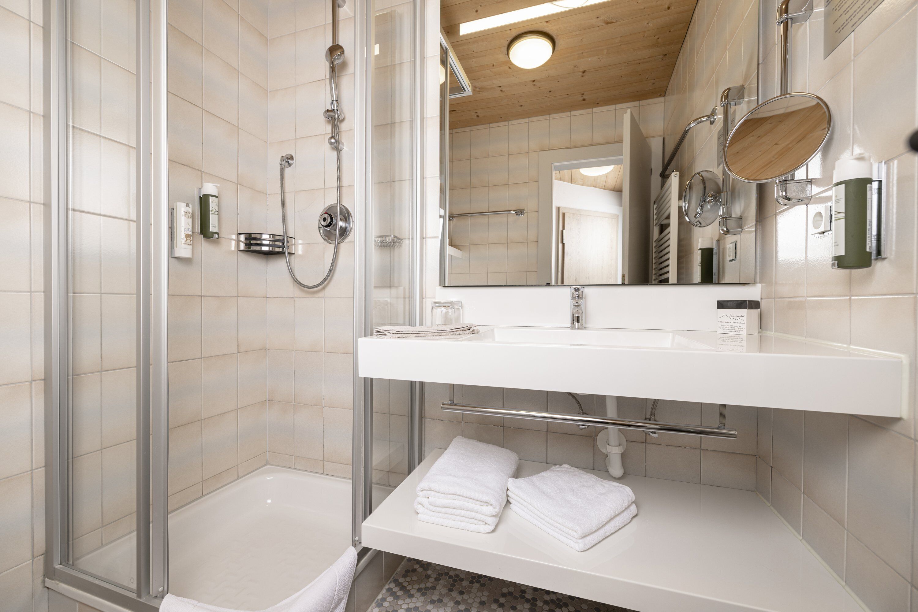 hair dryer, bathrobes, towels