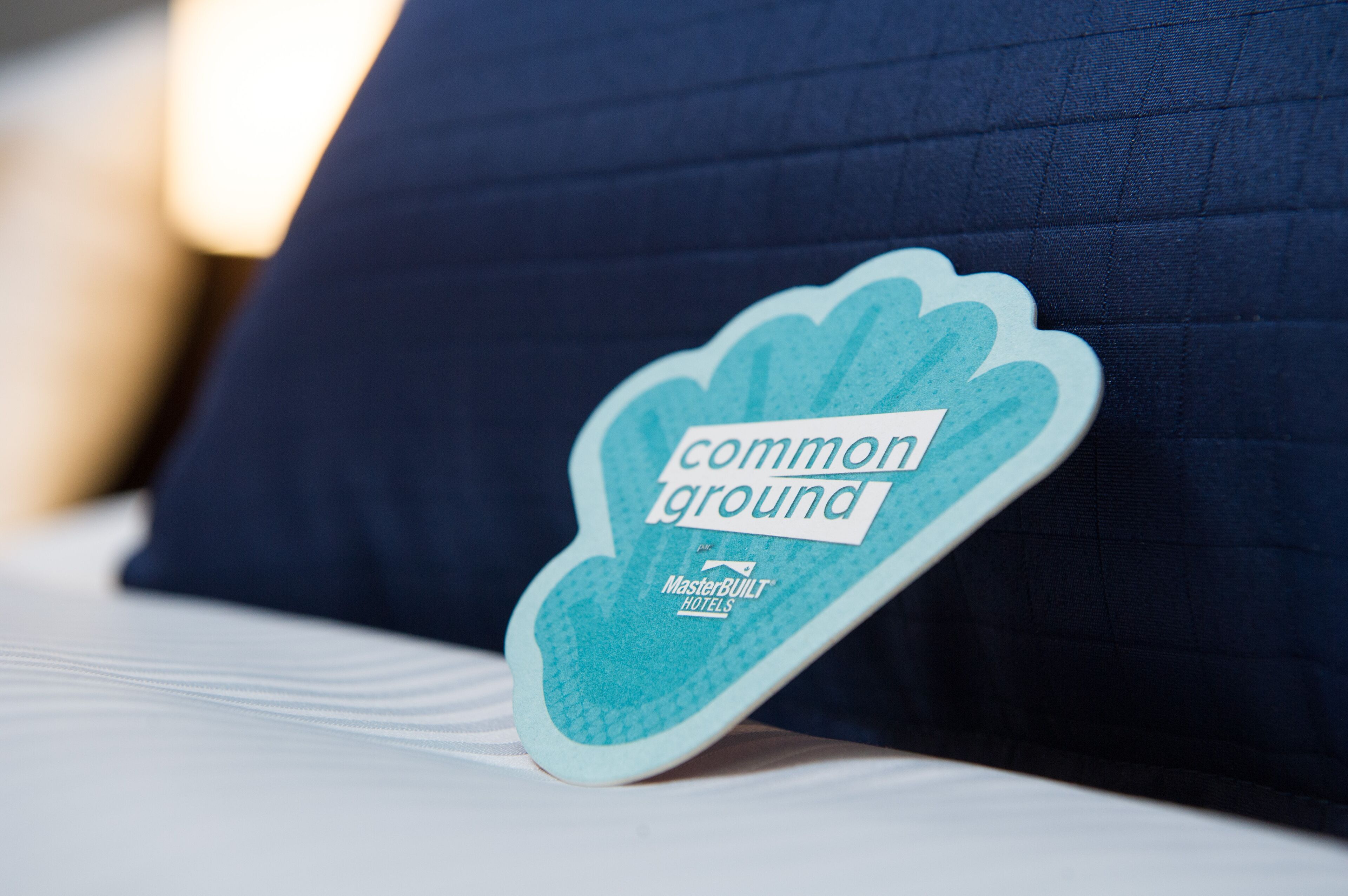 premium bedding, pillow-top beds, desk, blackout curtains