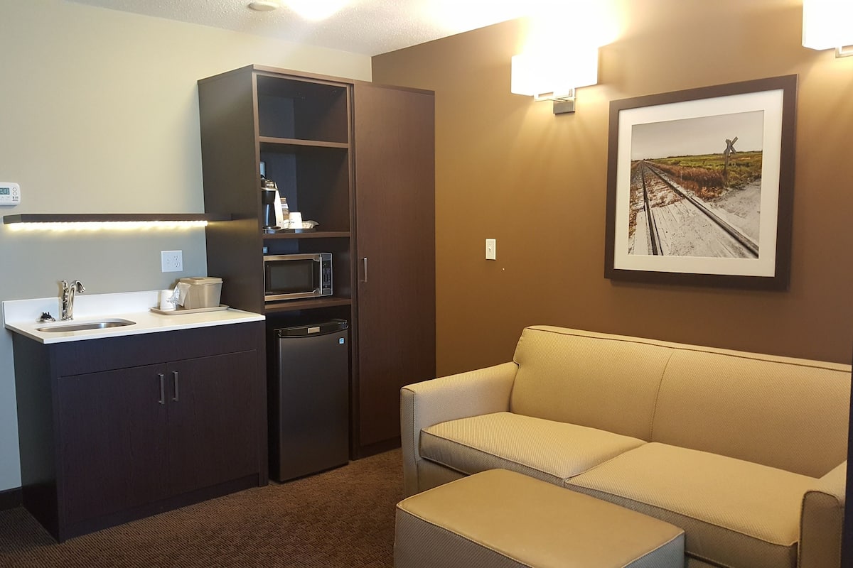 premium bedding, pillow-top beds, desk, blackout curtains