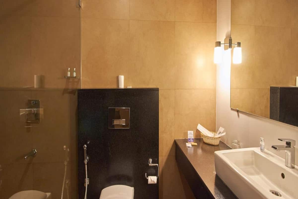 reserva suite | bathroom | designer toiletries, hair dryer, bathrobes, slippers