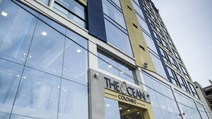 A modern building with reflective glass windows and a sign reading "THE OCEAN Colombo". - The Ocean Colombo (Colombo)