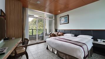 Habitación Doble Deluxe | Edredones de plumas, cortinas opacas, wifi gratis y ropa de cama