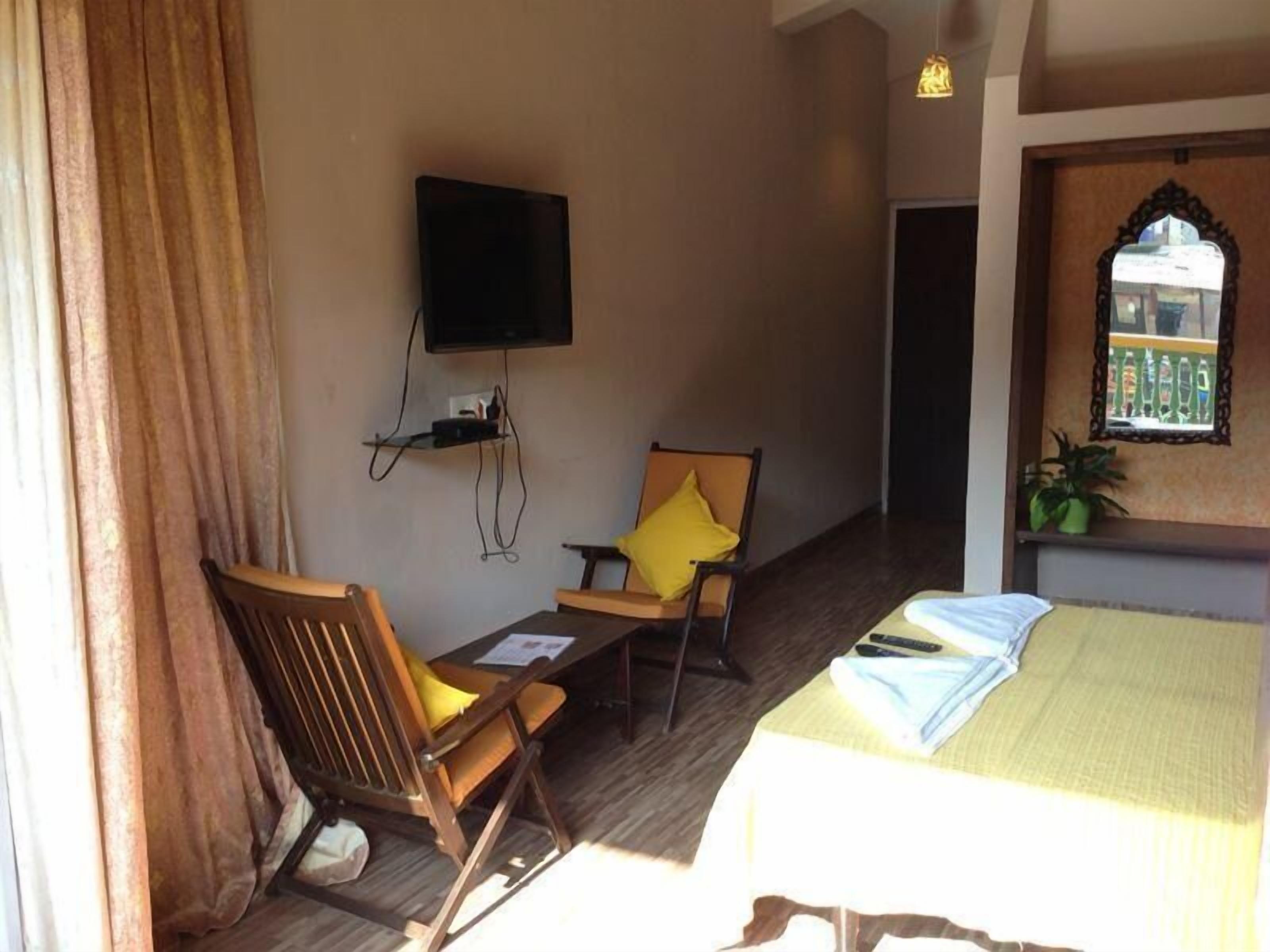 executive room (ac) | blackout curtains, iron/ironing board, free wifi