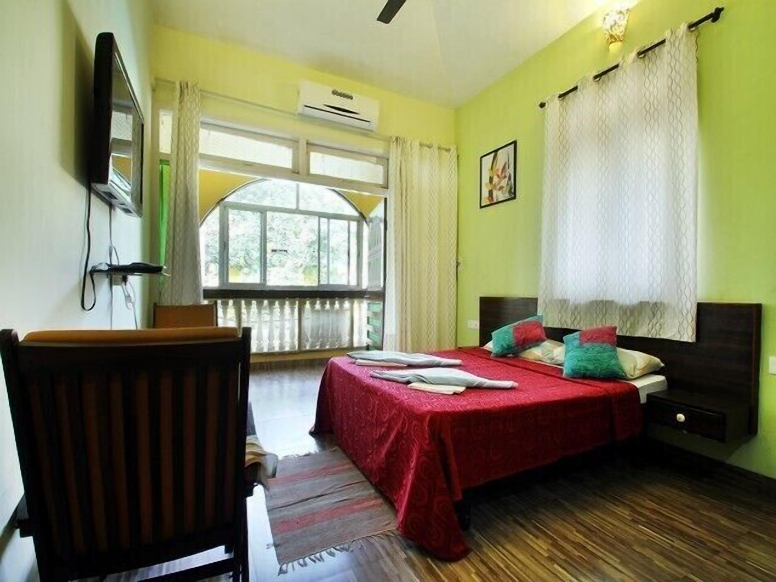 deluxe room (non ac) | blackout curtains, iron/ironing board, free wifi