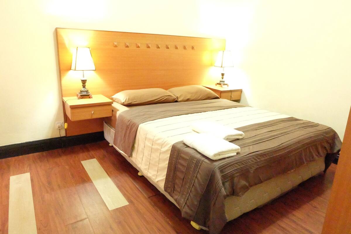 Superior Suite, 3 Bedrooms, City View | Desk, laptop workspace, iron/ironing board, free WiFi