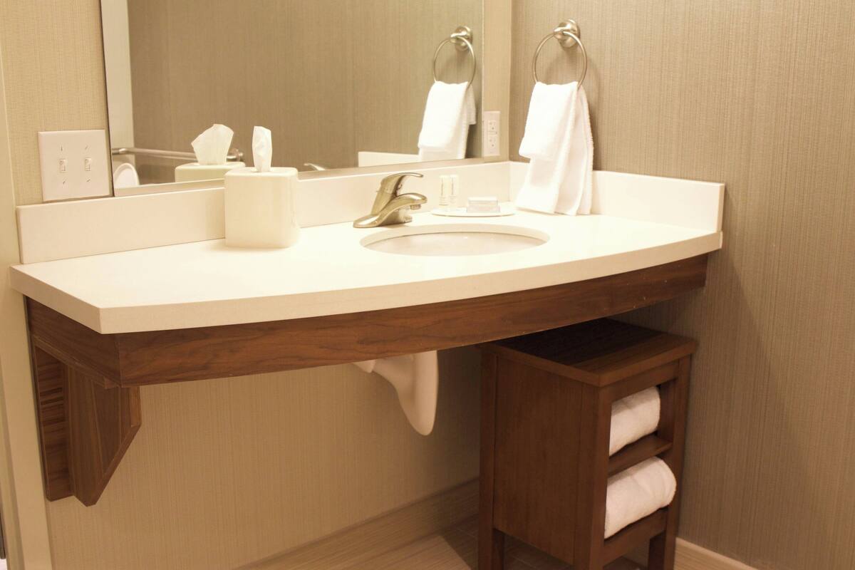 suite, multiple beds | bathroom | combined shower/bathtub, hair dryer, towels