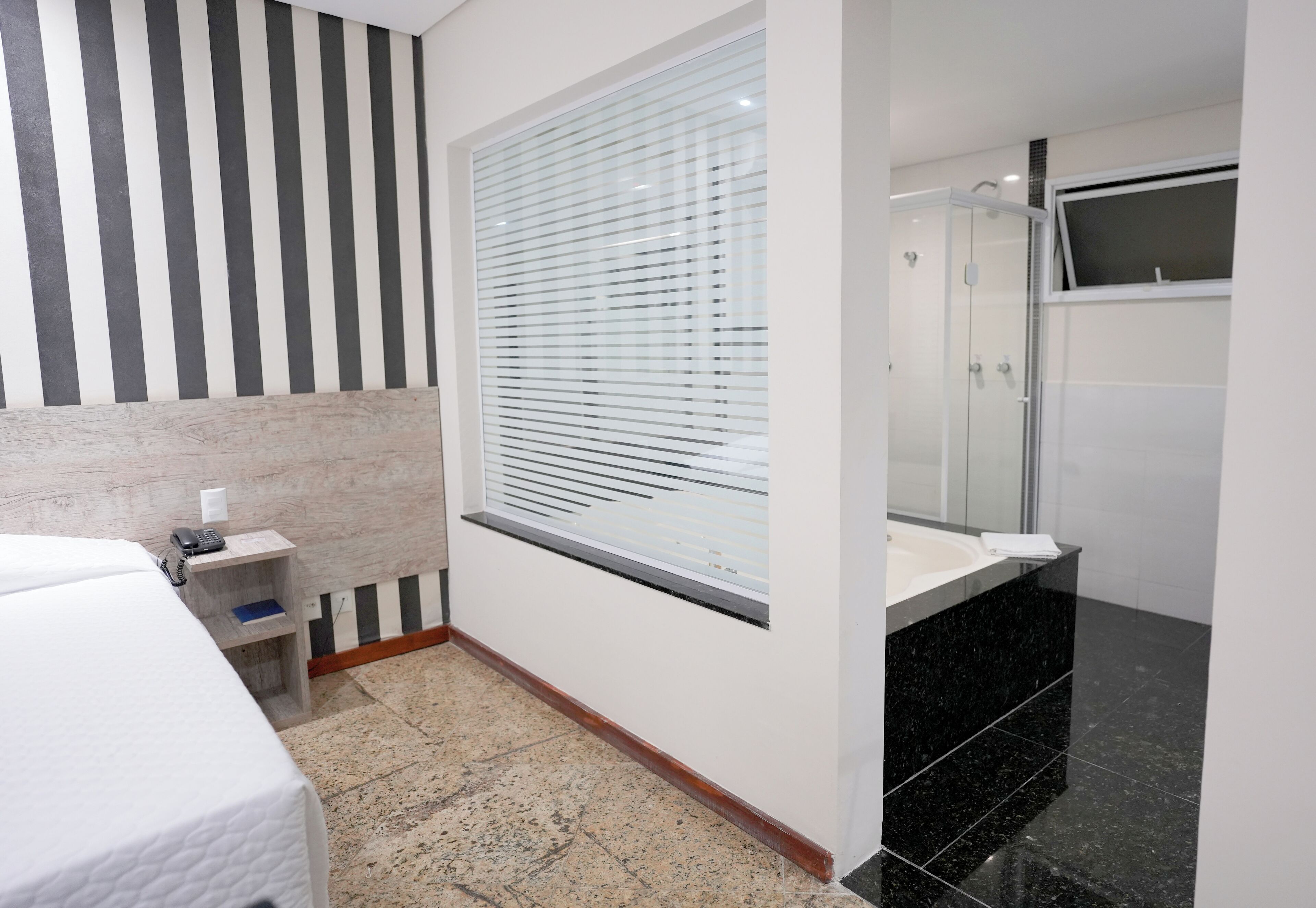 Master Suite | Bathroom | Shower, rainfall showerhead, hair dryer, towels