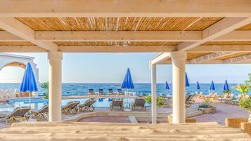 Outdoor pool, open 8:00 AM to 8:30 PM, pool umbrellas, sun loungers