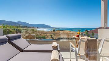 Suite – deluxe, sjøutsikt | Terrasse/patio