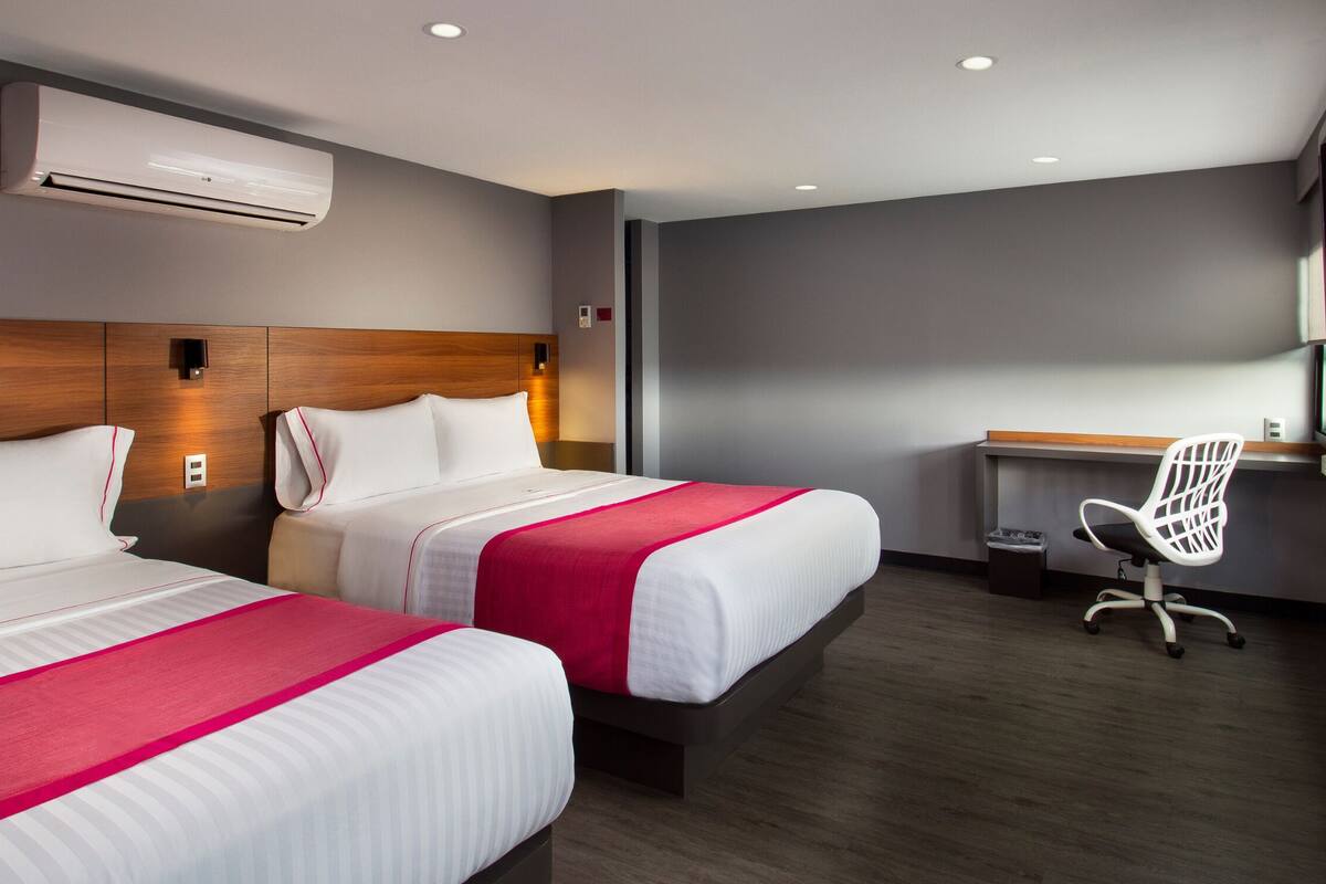 double room, 2 queen beds | in-room safe, desk, iron/ironing board, free wifi