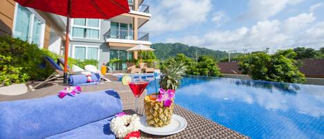 Outdoor pool, sun loungers