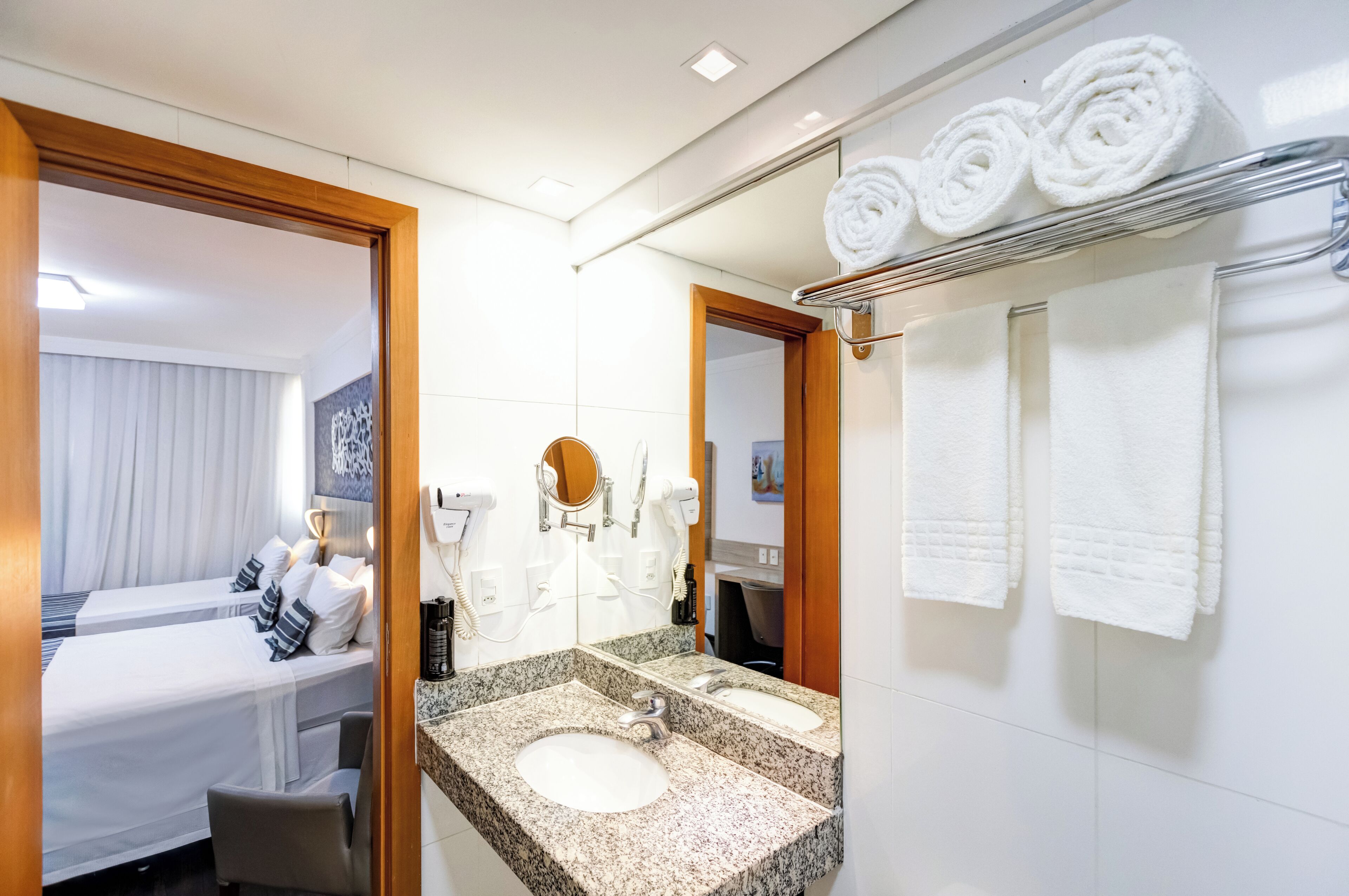 deluxe triple room | bathroom | shower, free toiletries, hair dryer, towels