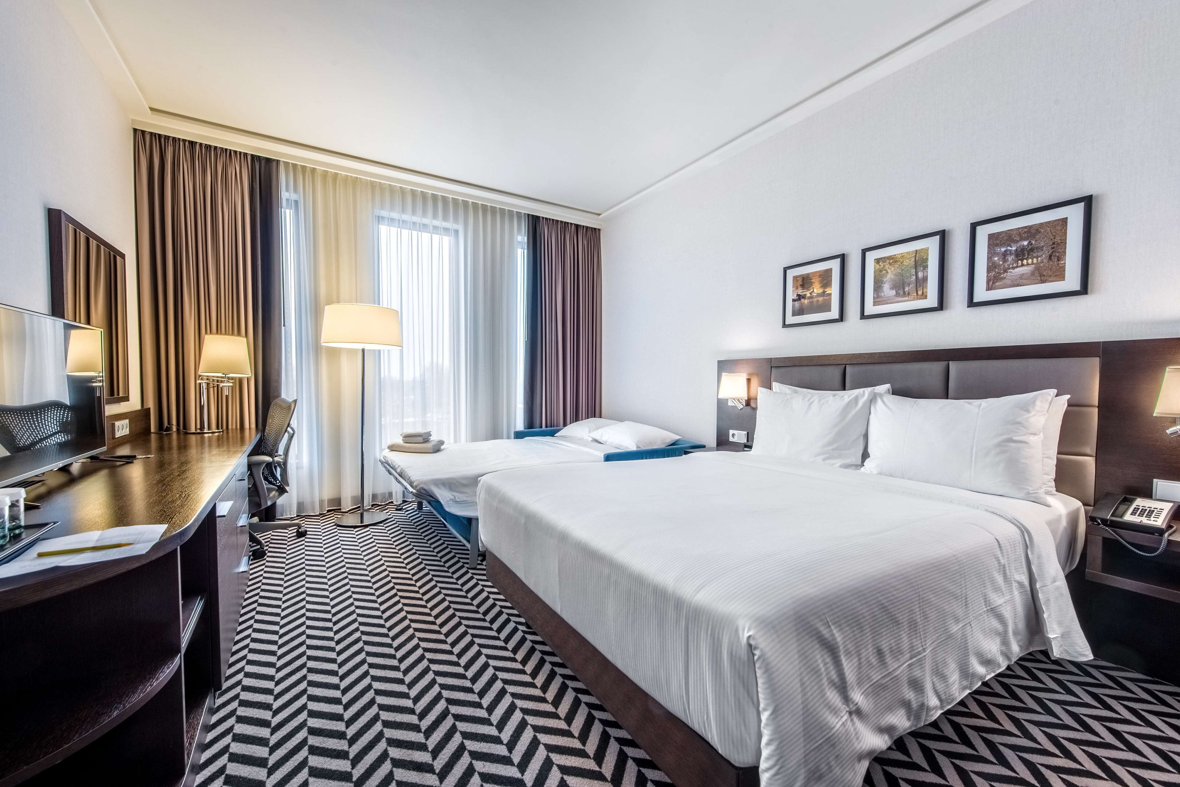 Premium bedding, memory-foam beds, in-room safe, desk
