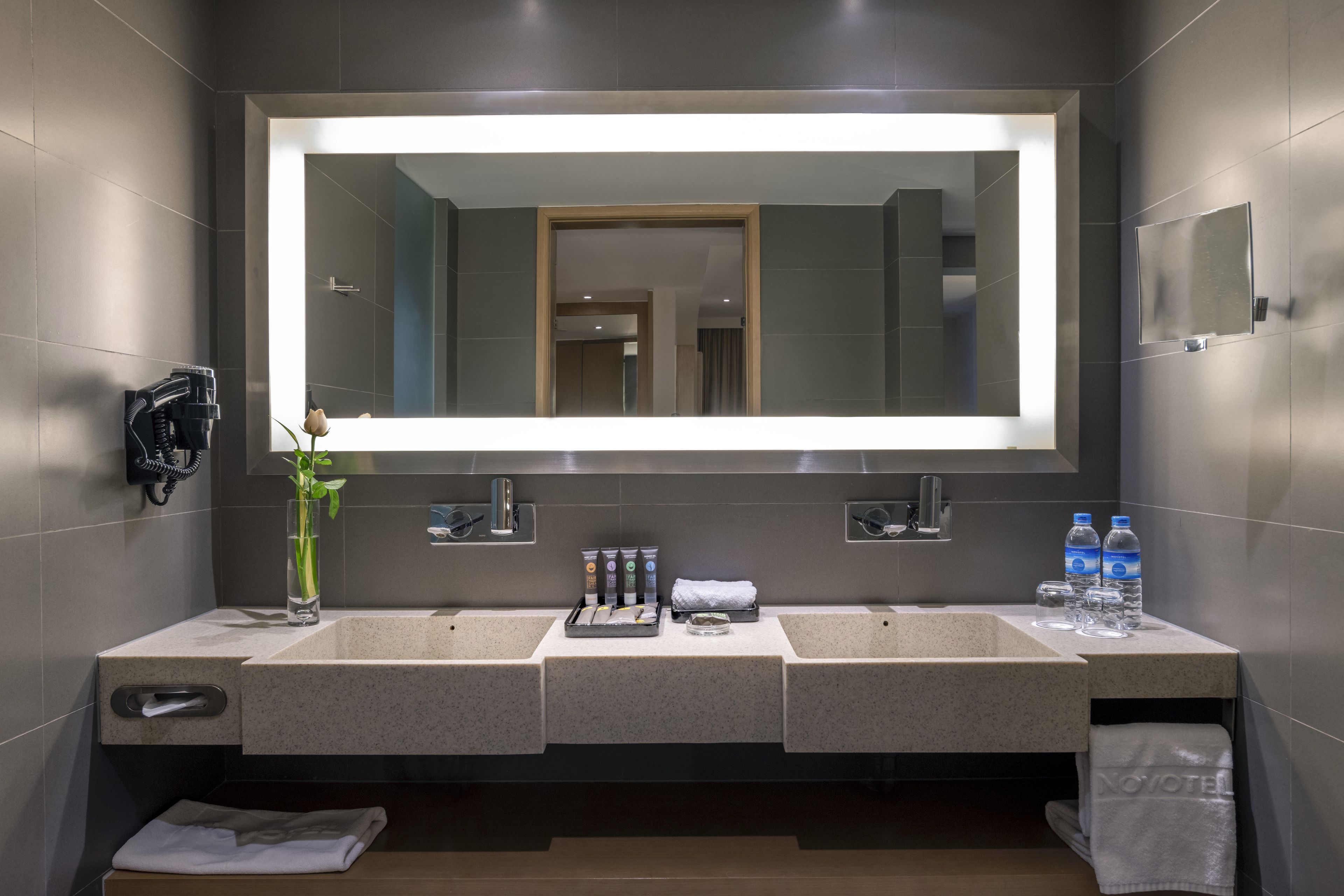 combined shower/bathtub, rainfall showerhead, eco-friendly toiletries