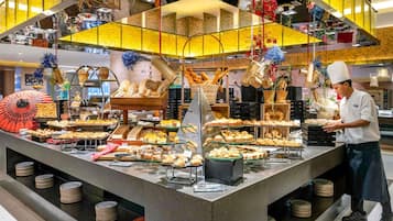 Daily buffet breakfast (USD 28 per person)