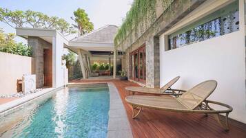 Villa, 1 King Bed | Living area | 32-inch flat-screen TV with cable channels, LED TV