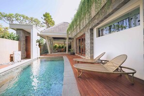 Vila, 1 Tempat Tidur King | Area keluarga | Televisi layar datar 32-inci dengan saluran TV kabel dan TV LED