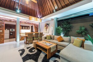 Two-bedroom Royal Pool Villa | Living area | 32-inch flat-screen TV with cable channels, LED TV