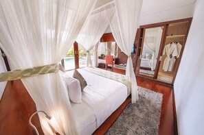 Three-bedroom Family Pool Villa | Minibar, in-room safe, desk, laptop workspace