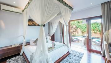 Three-bedroom Family Pool Villa | Minibar, in-room safe, desk, laptop workspace