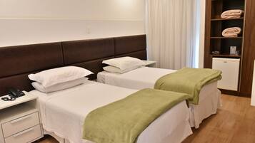 Quarto luxo | Frigobar, quartos à prova de som, Wi-Fi de cortesia, roupa de cama