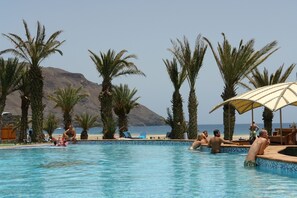 2 outdoor pools, pool umbrellas, pool loungers