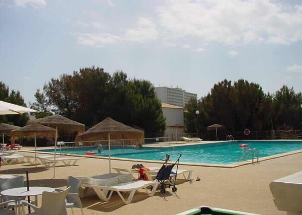 Outdoor pool, pool umbrellas, pool loungers