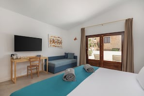 Habitación Deluxe | Minibar, escritorio, wifi gratis y ropa de cama