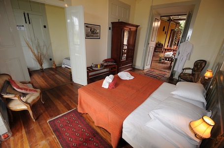Room 1 (Family Room) With private bathroom outside - Second Floor | 客房内保险箱、隔音、床单. 殖民风旅馆