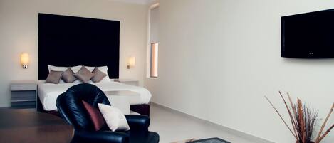 Premium bedding, desk, laptop workspace, blackout curtains