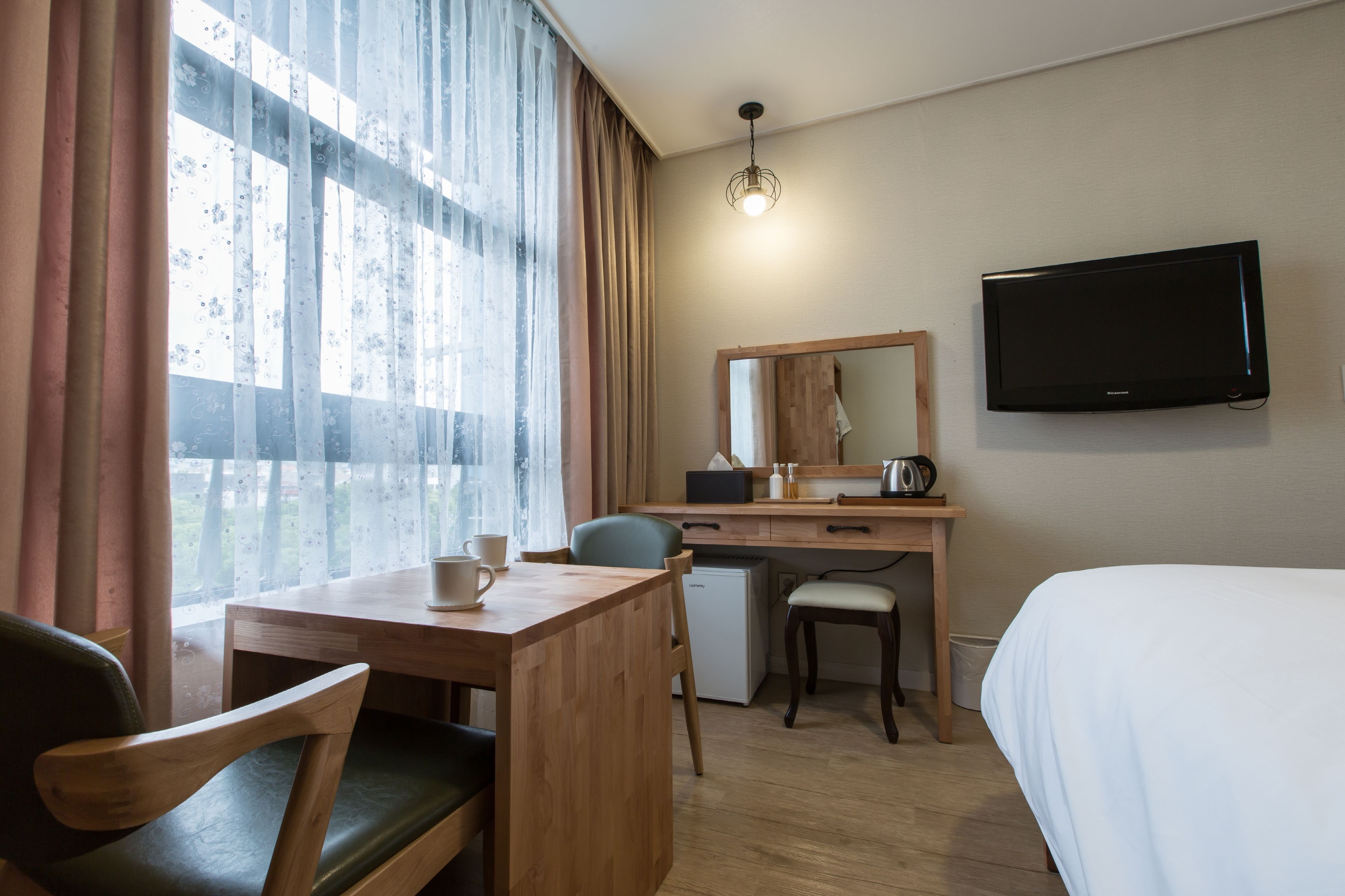 standard double room | down duvets, free minibar, individually decorated