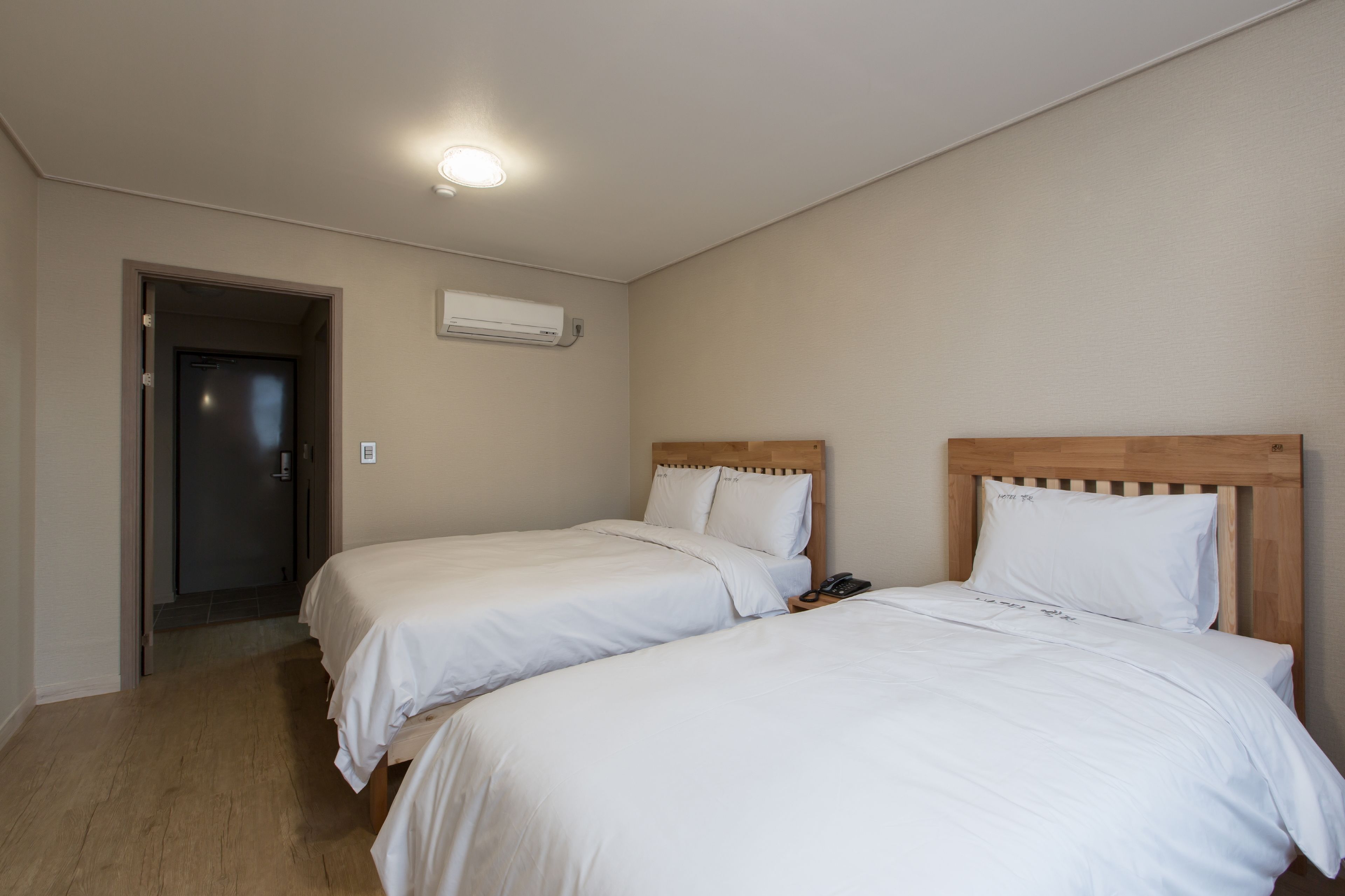 deluxe twin room | down duvets, free minibar, individually decorated