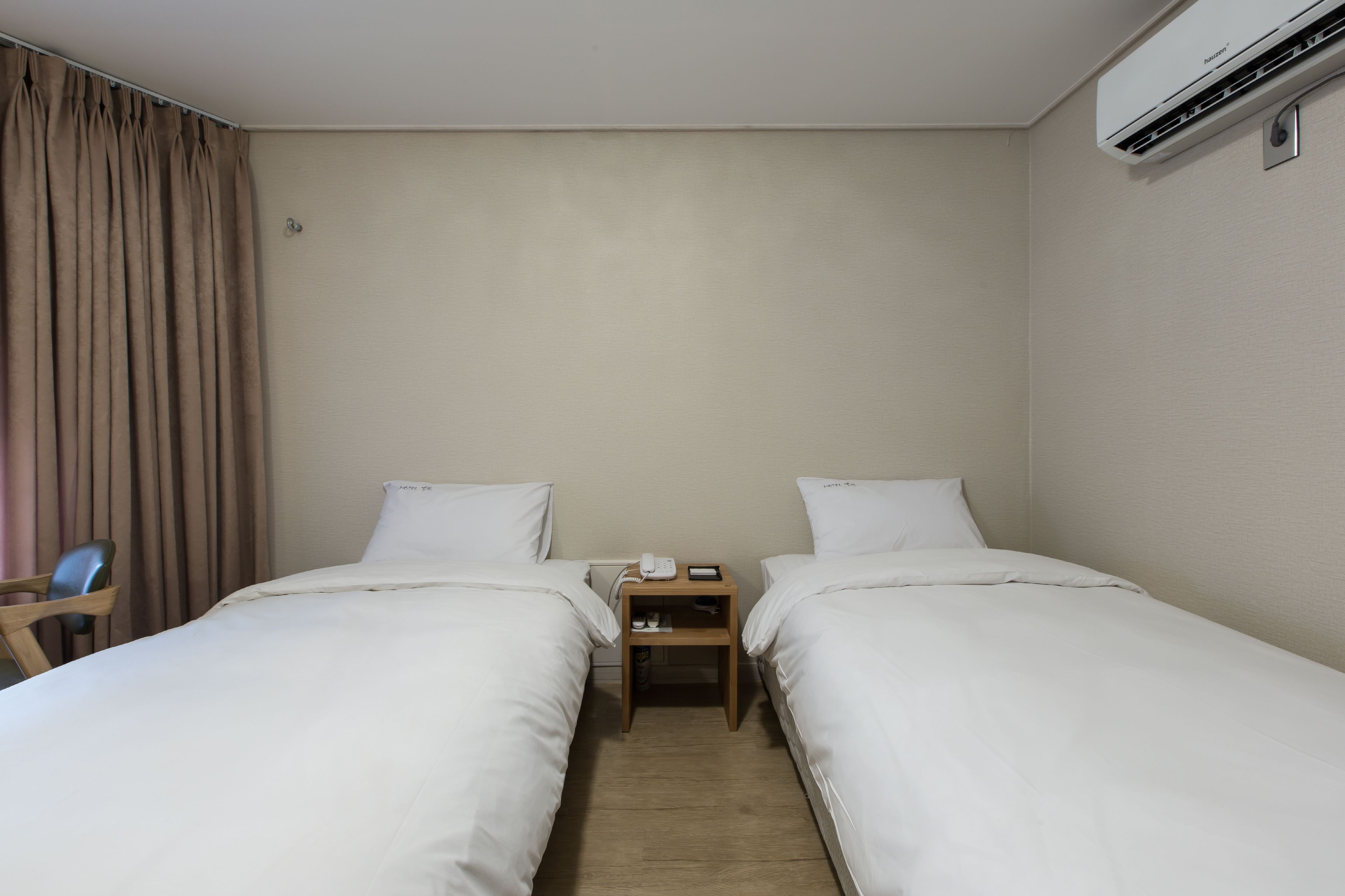 superior twin room | down duvets, free minibar, individually decorated