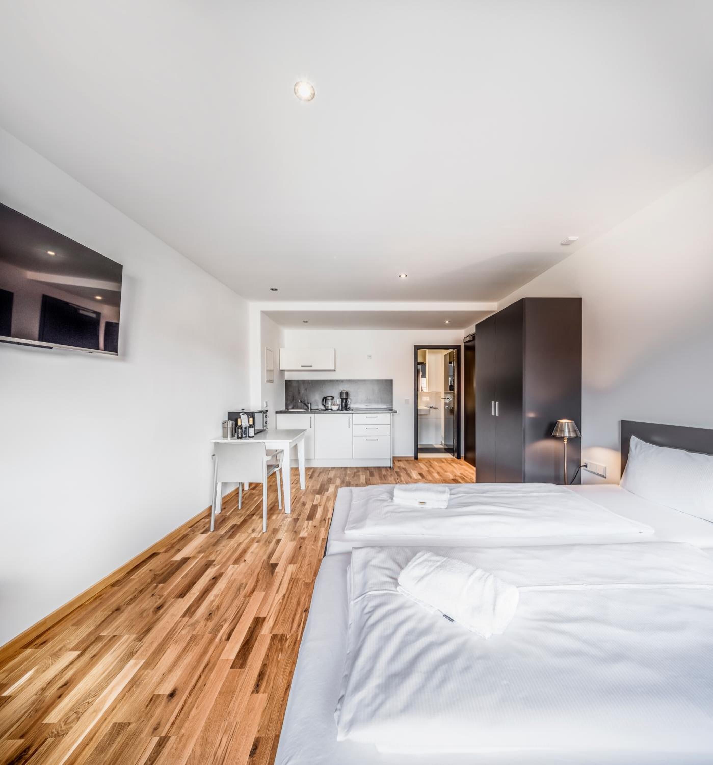 Desk, laptop workspace, free WiFi, bed sheets
