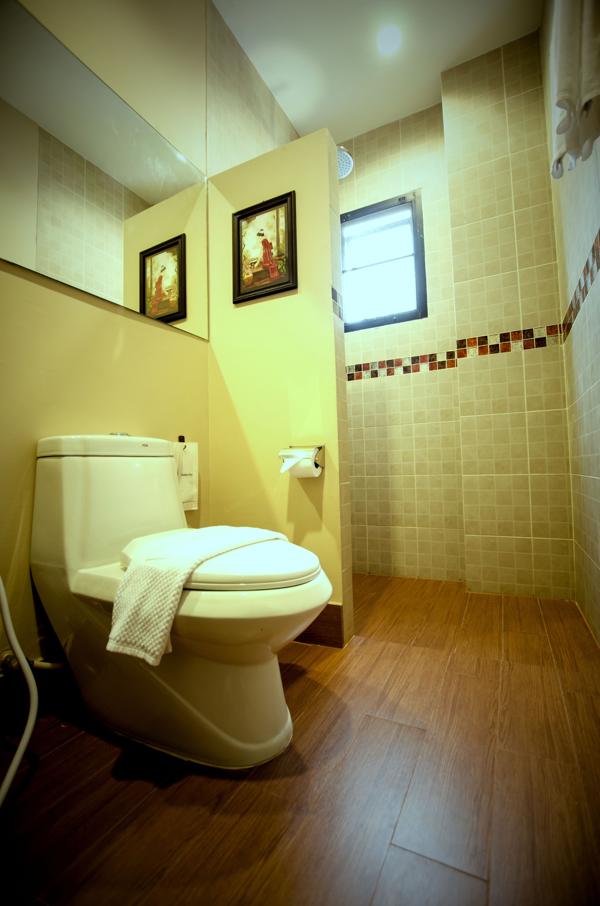 deluxe room, pool access | bathroom | shower, rainfall showerhead, free toiletries, hair dryer