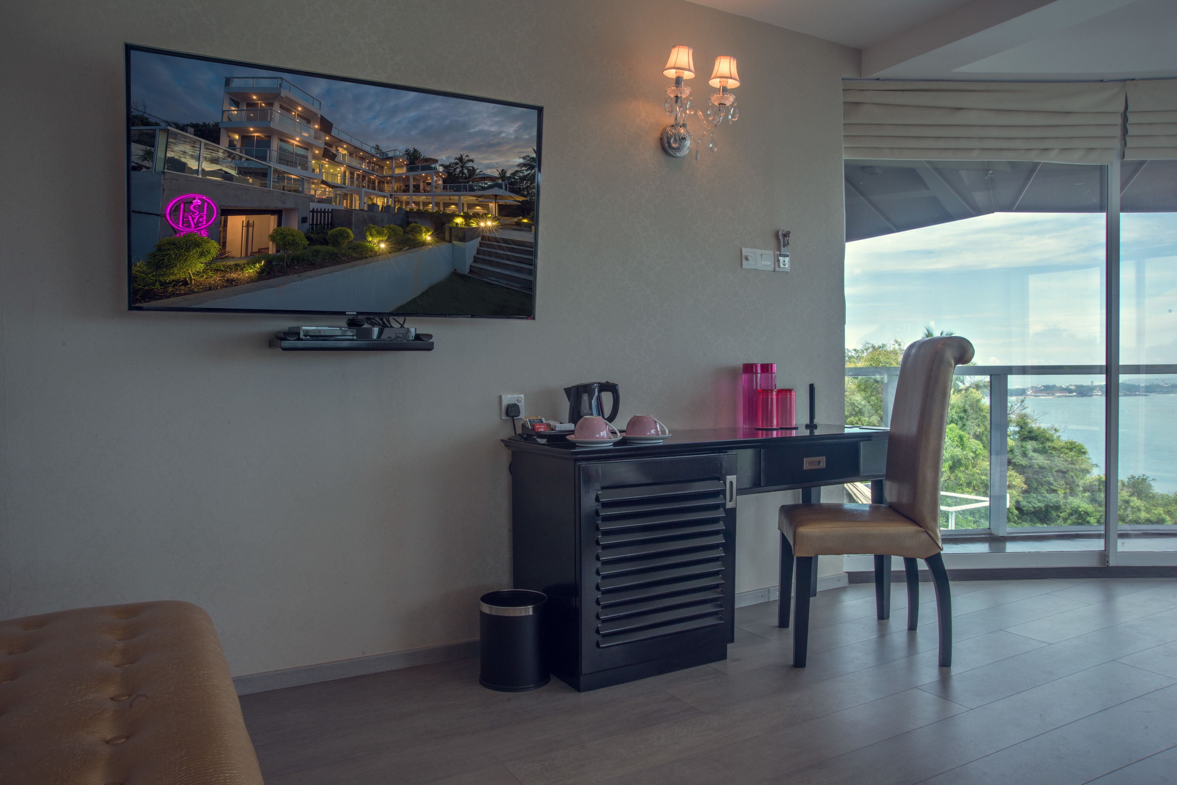 suite with sea view | living area | 50-inch led tv with cable channels, tv