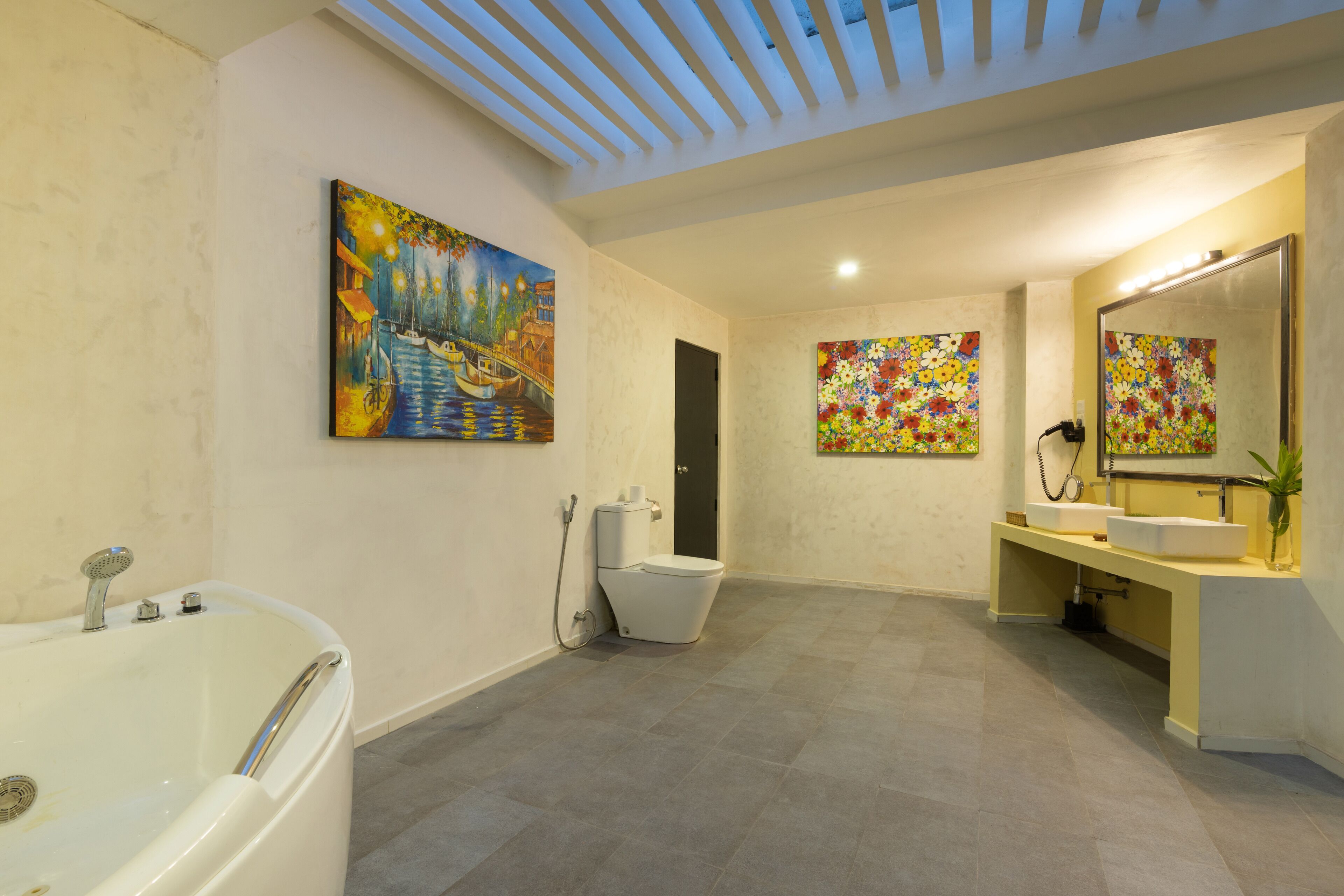 deluxe family room | bathroom | free toiletries, hair dryer, bathrobes, bidet