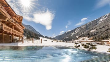 Indoor pool, outdoor pool, pool umbrellas