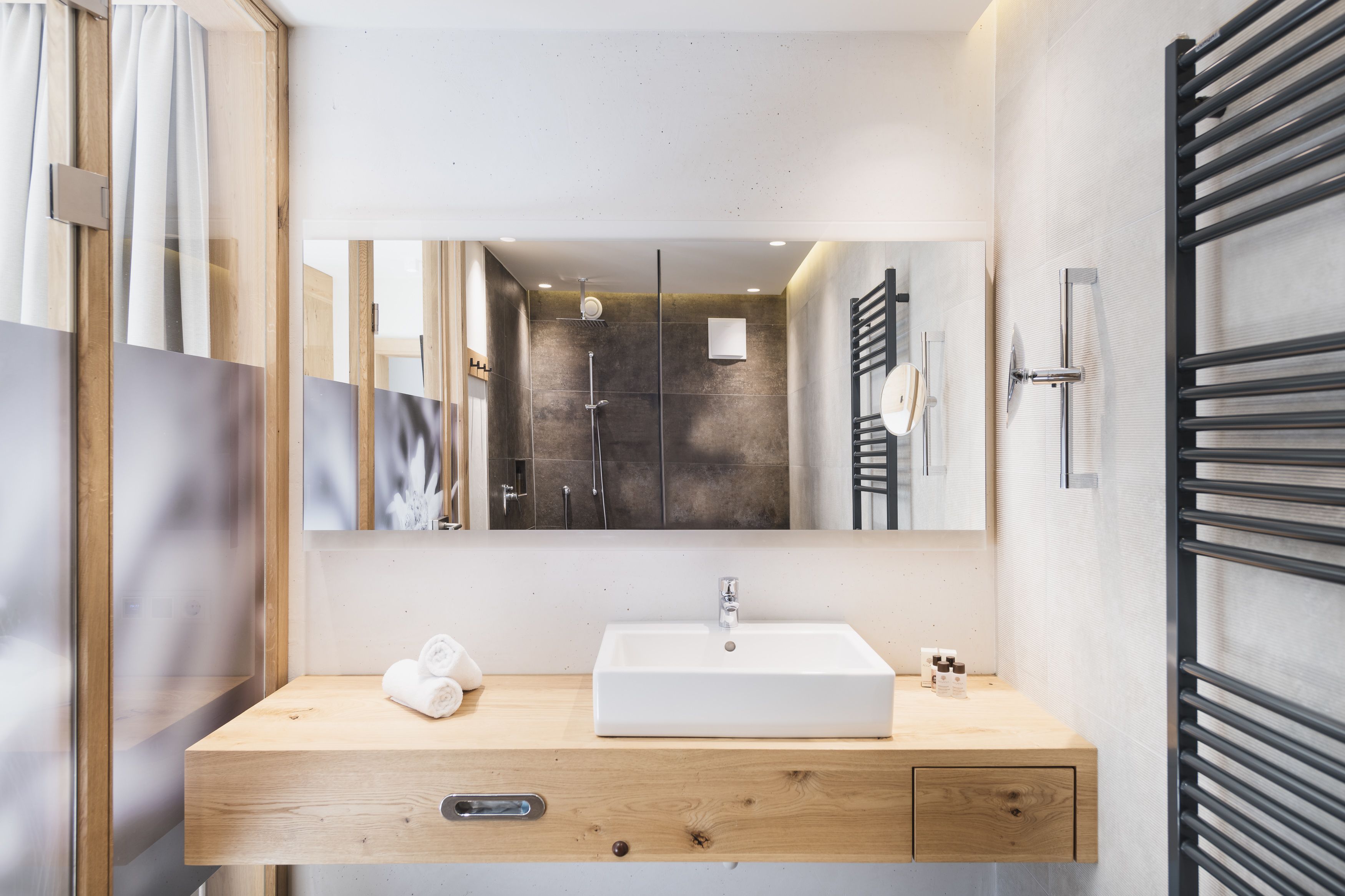 country house family chalet | bathroom | designer toiletries, hair dryer, bathrobes, slippers