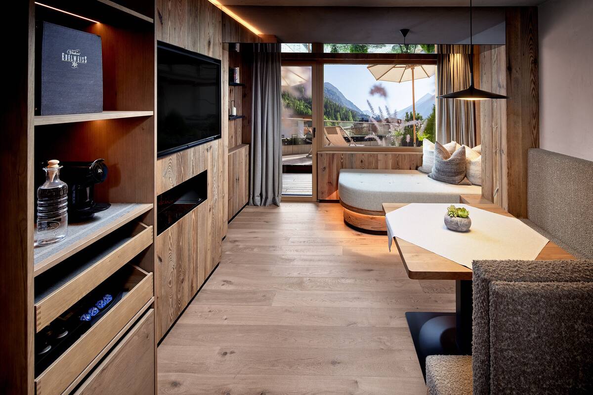 Tower-Suite with Mountain View and Terrace | Living area | Flat-screen TV, fireplace, table football, ping pong