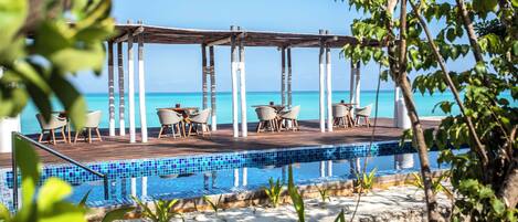 Outdoor pool, pool umbrellas, pool loungers