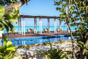 Outdoor pool, pool umbrellas, pool loungers