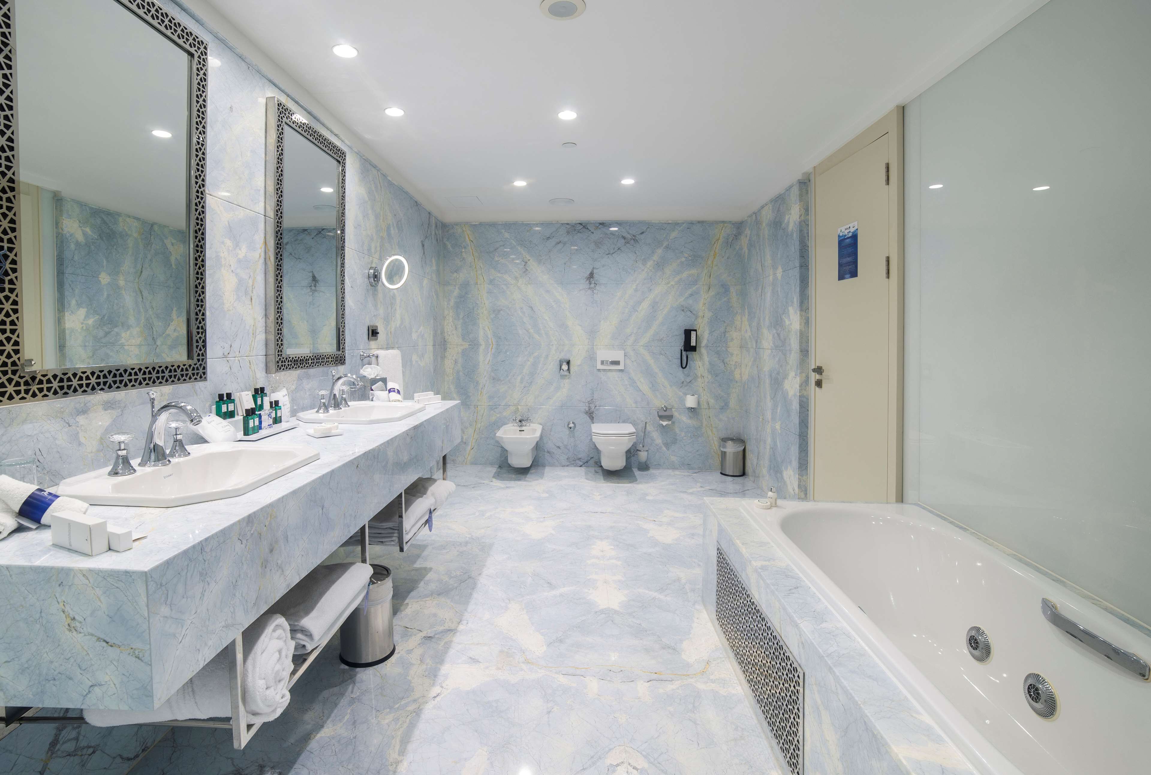 presidential suite | bathroom | free toiletries, hair dryer, slippers, towels