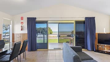 Deluxe 2 Bedroom Cabin - Sleeps 4 | Living area | TV