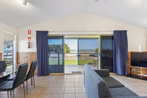Deluxe 2 Bedroom Cabin - Sleeps 4 | Living area | TV