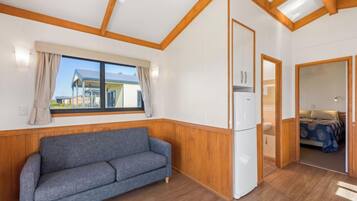 Superior 2 Bedroom Seaview Cabin - Sleeps 4 | Living area | TV