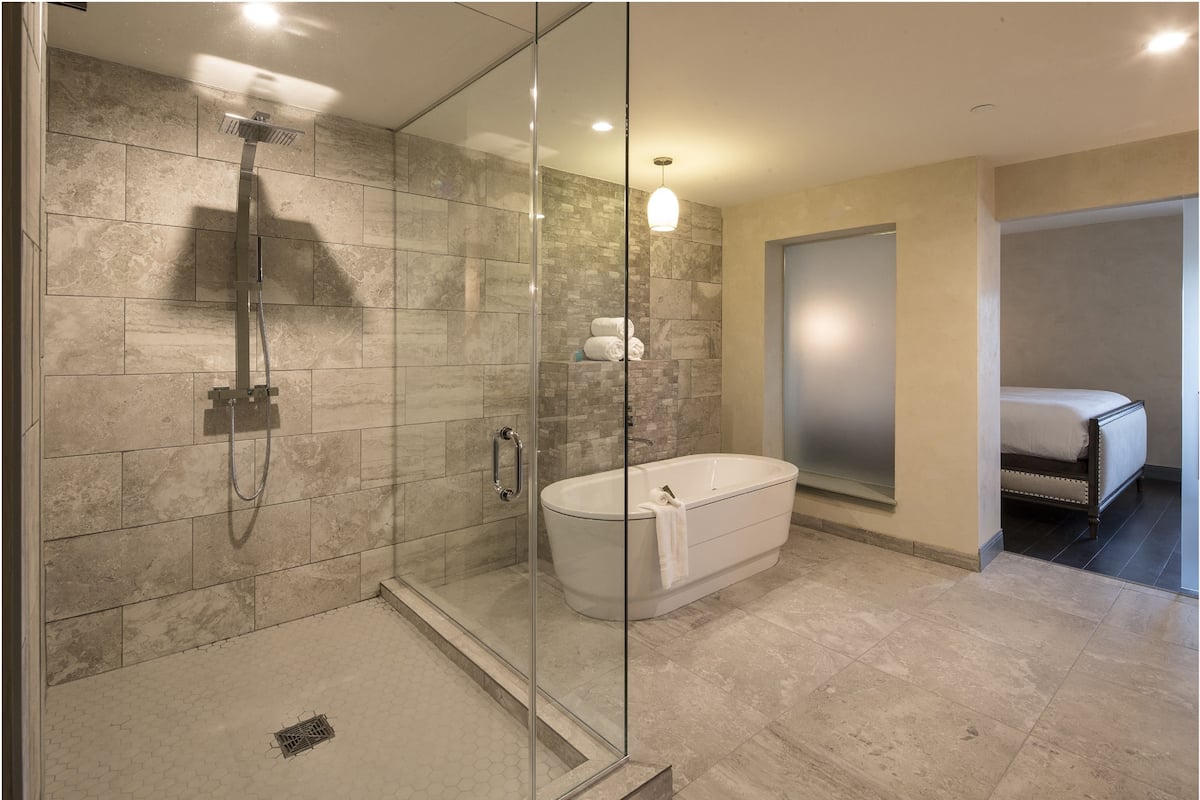Suite, 1 King Bed (Additional Living and Dining Area) | Bathroom | Shower, designer toiletries, hair dryer, towels
