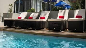 Outdoor pool, pool umbrellas, pool loungers