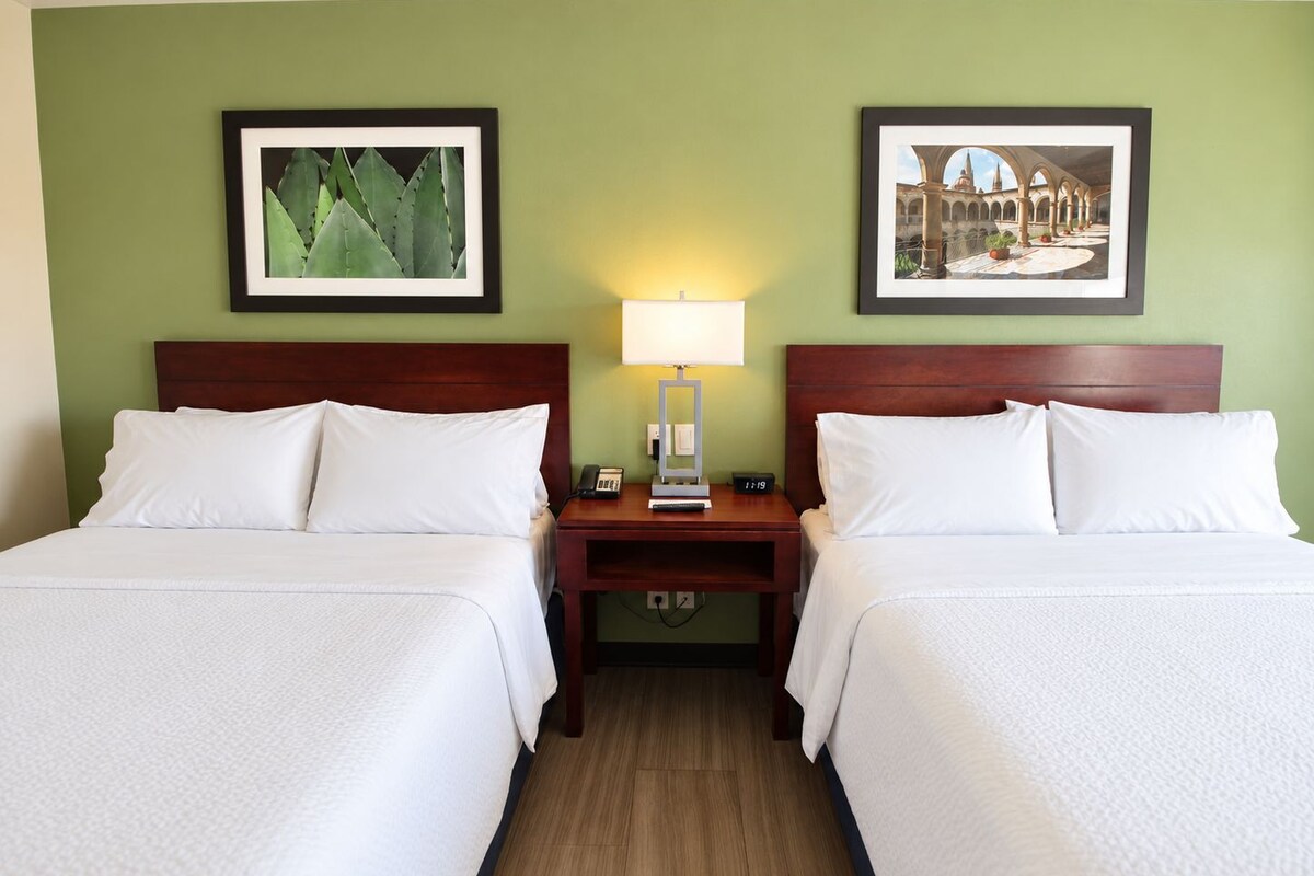 Standard Room, 2 Queen Beds (Central Building) | Desk, blackout drapes, iron/ironing board, WiFi (free)