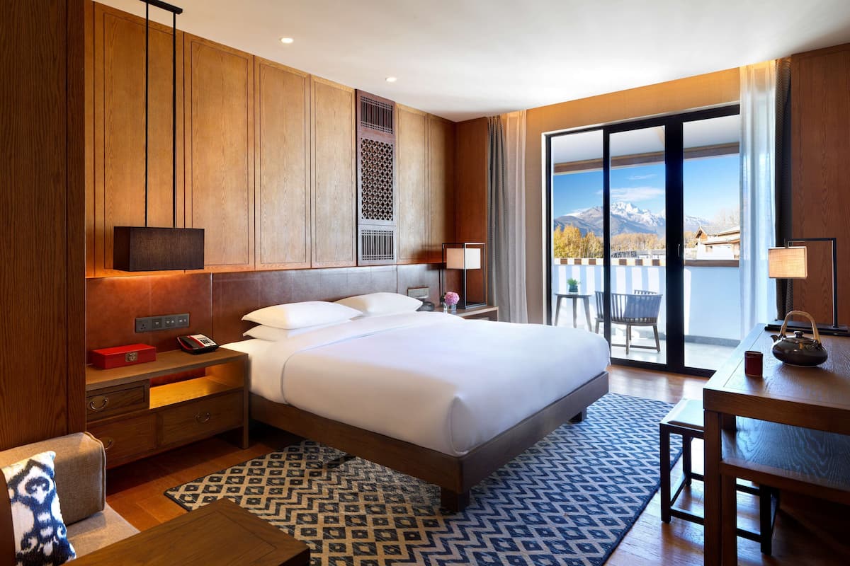 Luxe beddengoed, een minibar, een kluis op de kamer, een bureau